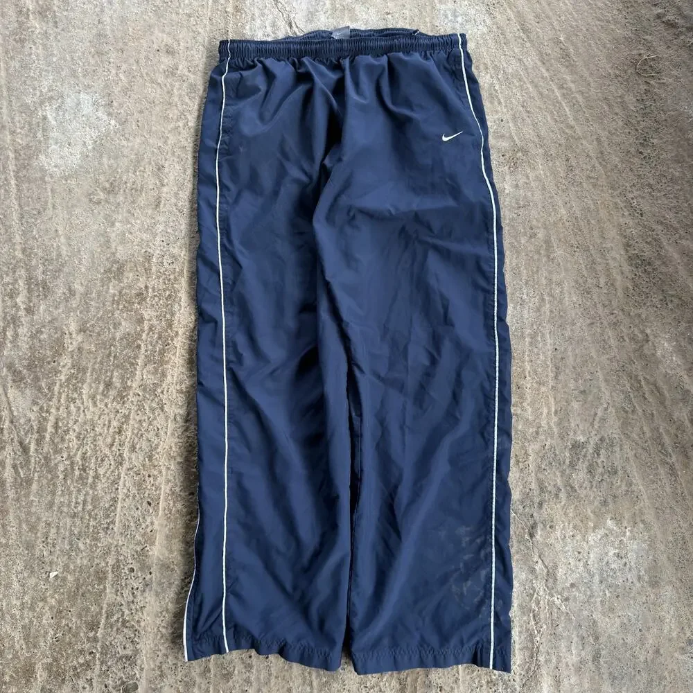 Vintage 00s Nike Track Pants Windbreaker Nylon 2XL Baggy Athletic Leisure Y2K